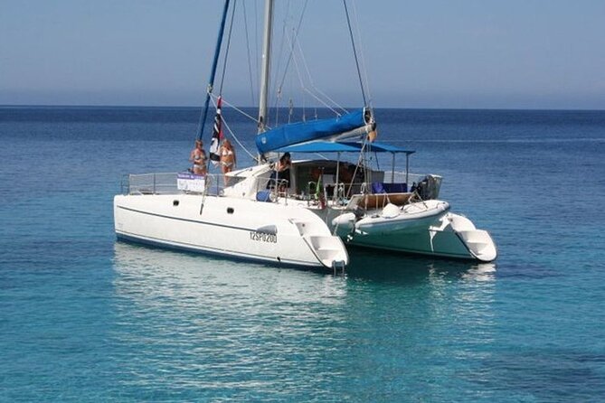 2-Catamaran tour from Cannigione to the Maddalena Archipelago - Lunch, aperitivo, and life aboard Miguel