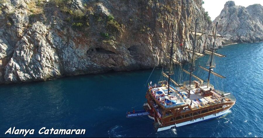 Alanya: Catamaran Boat Trip with Swim Stops and Sunbathing - Pirates, Lovers, and Phosphorus Caves from the sea