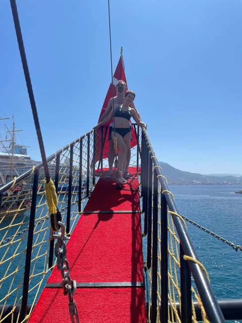 Alanya: Luxury Pirate Boat with Lunch & Unlimited Drinks - Hotel pickup, harbor meeting, and changing schedules