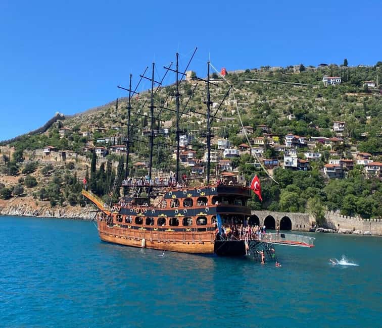 Alanya: Luxury Pirate Boat with Lunch & Unlimited Drinks - Leaving Alanya harbor for castle and cave views