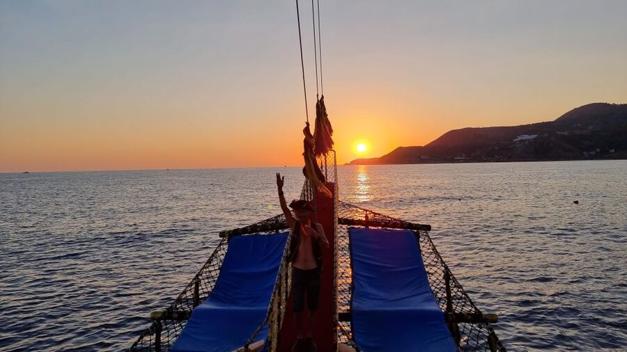 Alanya: Sunset Cruise with Dinner - Leaving Alanya Harbor beside the Red Tower