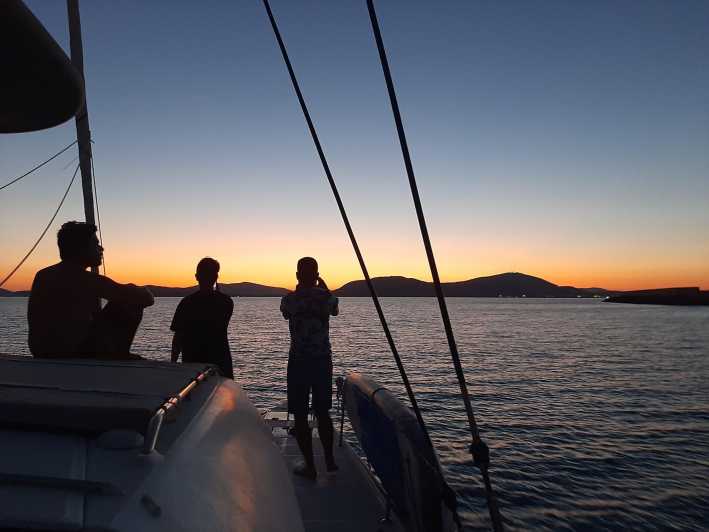 Alghero catamaran sunset tour Alghero - Sailing beside the old city walls