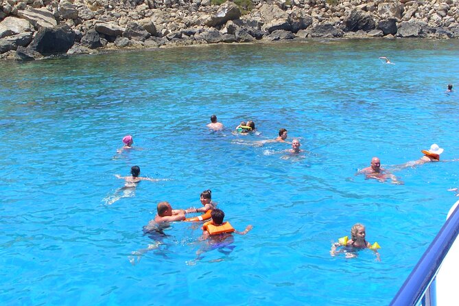 APHRODITE II -LAZY DAY CRUISE-BLUE LAGOON,TURTLE COVE, with LUNCH - Lover’s Bridge and the chapel above the sea cave