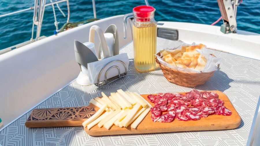 Asinara: Full Day Sailboat Excursion from Stintino - Pane guttiau, seafood, and Vermentino