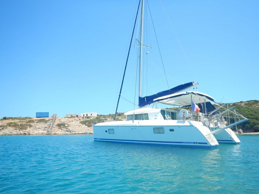 Athens: Catamaran Cruise with Fresh Lunch and Wine - Sailing back with fruit, wine, and possible sunset views