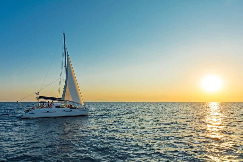 Athens: Half-Day Sunset Catamaran Cruise with Meal & Drinks - Booking advice for a smoother outing