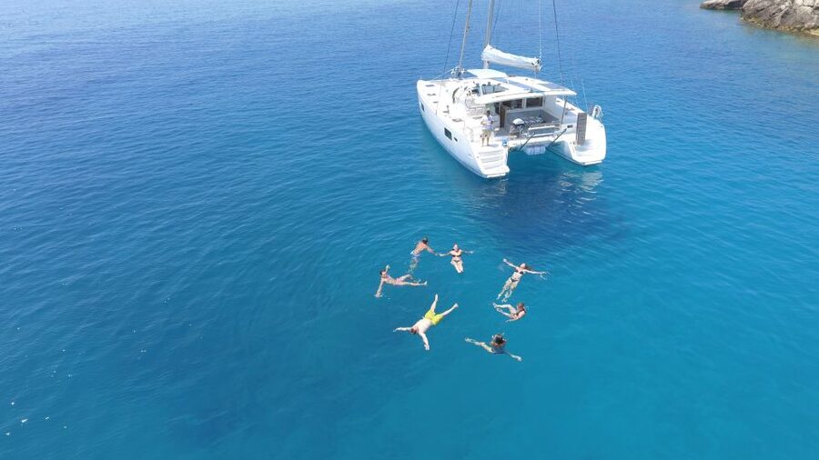 Athens: Riviera Catamaran Cruise with Meal and Drinks - First stop at Voula: swimming near Athens