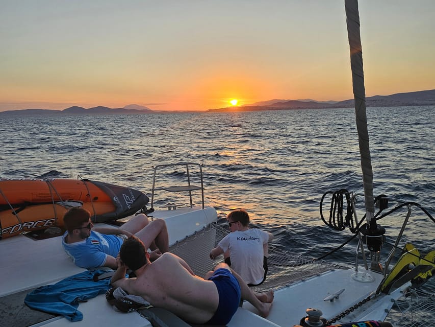 Athens: Riviera Catamaran Tour with Fresh Meal and Drinks - Hydrousa, snorkeling, and the second water stop