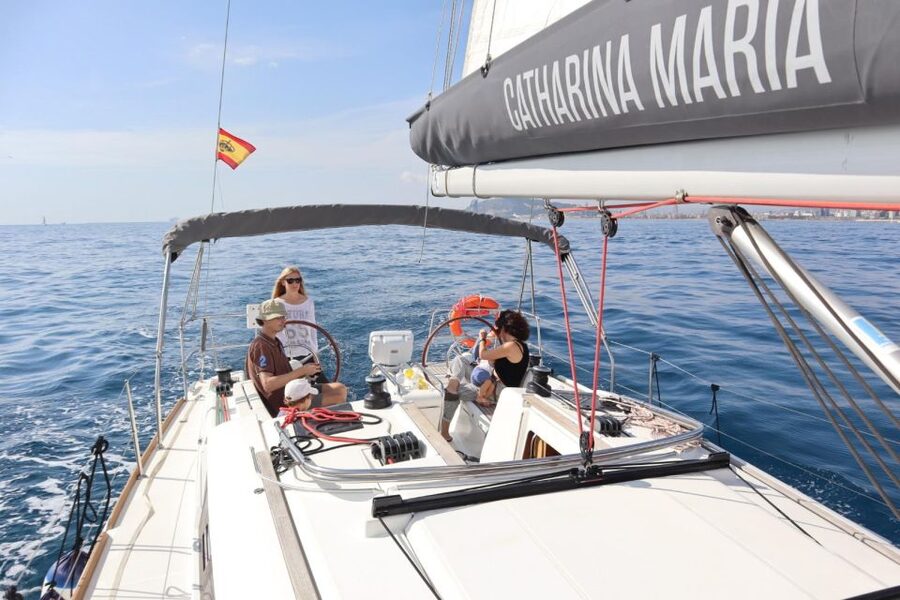Barcelona: 2-Hour Sailboat Tour with Paddle Boarding - Snacks, soft drinks, and a glass of cava