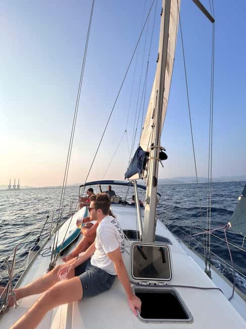 Barcelona Badalona : Sailboat Tour, Snacks, Drinks, Swimming - Swimming, paddleboarding, and time on deck
