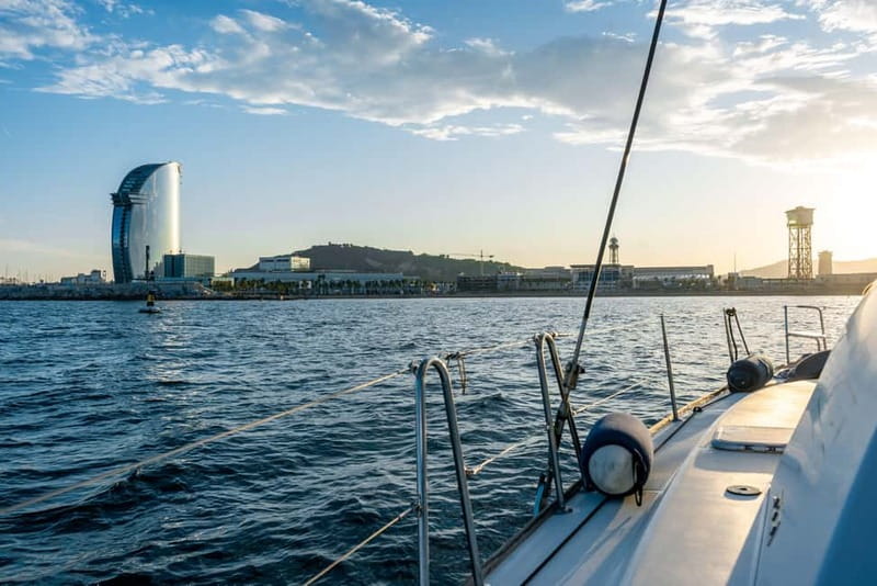 Barcelona: Catamaran Cruise w/ Sailing, Wine, & Tapa - Setting sail from Port Vell
