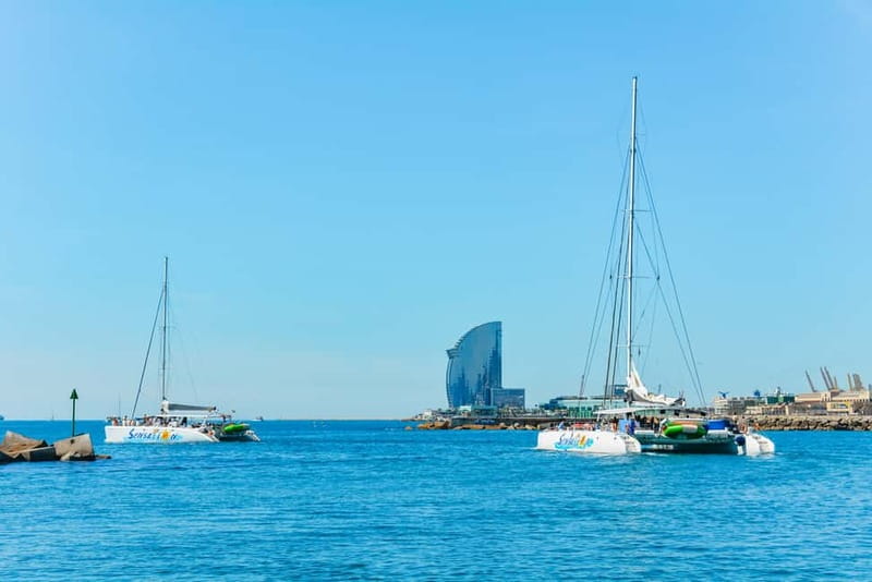 Barcelona: Catamaran Party Cruise with BBQ Meal - Music, dancing, and the crew’s role