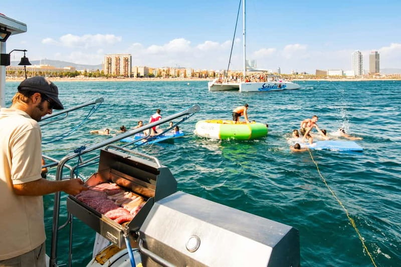 Barcelona: Catamaran Party Cruise with BBQ Meal - Finding the beach meeting point at Port Olímpic