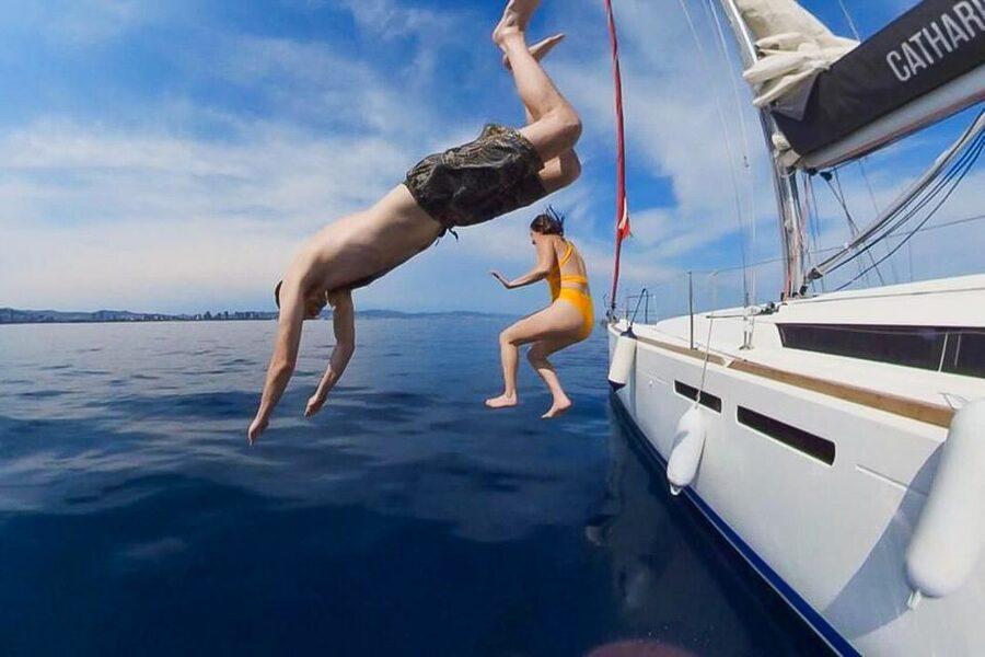 Barcelona: Coastline Boat Trip with Snacks and Cava - What Happens During the Two-Hour Trip