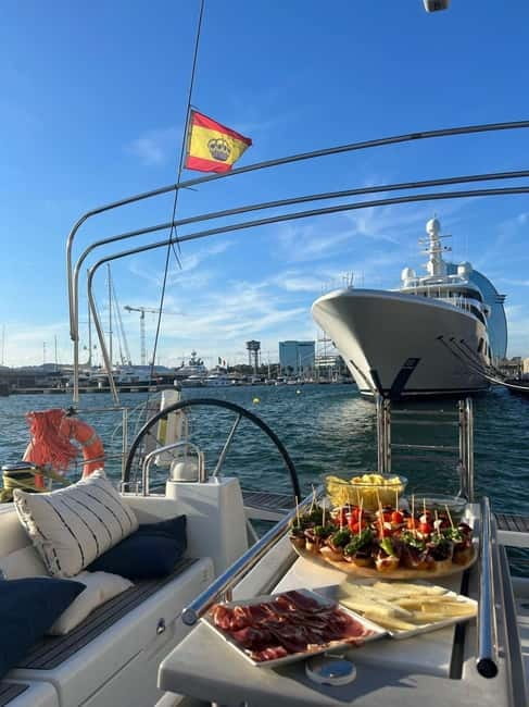 Barcelona: Sailing Tour + Food, Drinks, Swim & Sunset Option - Leaving Barcelona from Port Vela