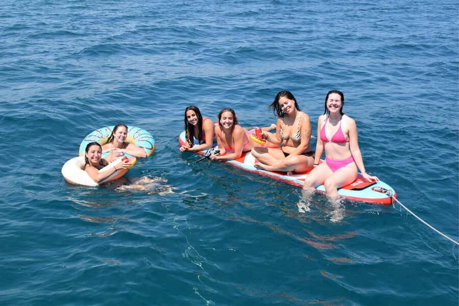 Barcelona: Sailing with Open Bar, Catalan Snack & Swim Stop - Leaving Marina Vela with Barcelona behind you
