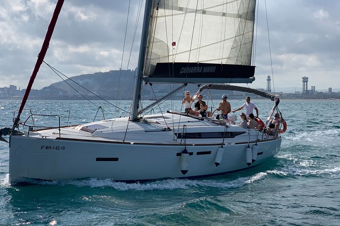 Barcelona Small Group Sailing with Snacks and Cava - Cava, snacks, and the social side of the trip