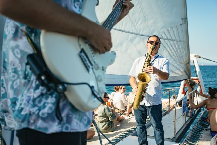Barcelona: Sunset Catamaran Cruise with Live Music - What the 90-minute sailing feels like