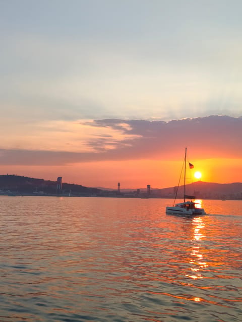 Barcelona: Sunset Cruise with Snacks and Drinks - Timing changes are the main practical concern