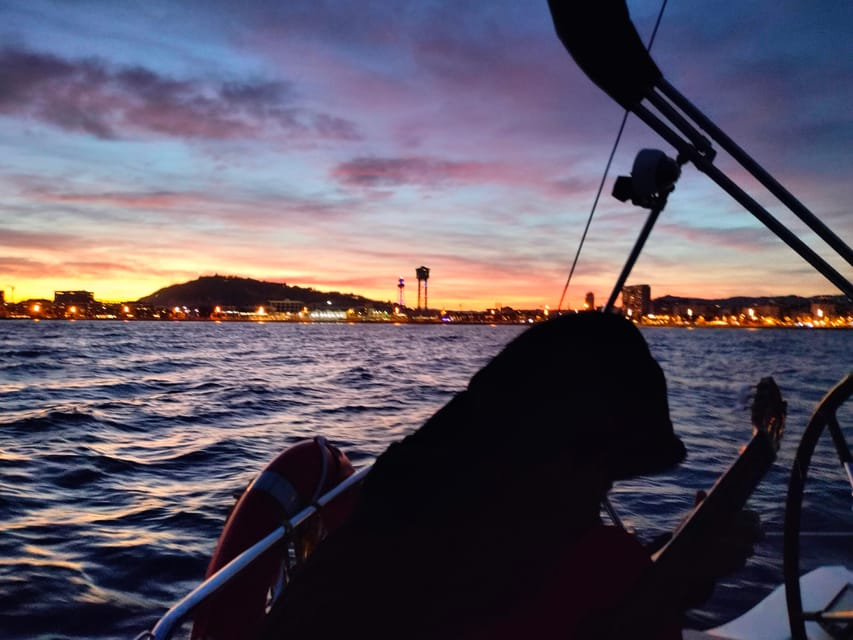 Barcelona: Sunset Cruise with Snacks and Drinks - Sunset, then city lights