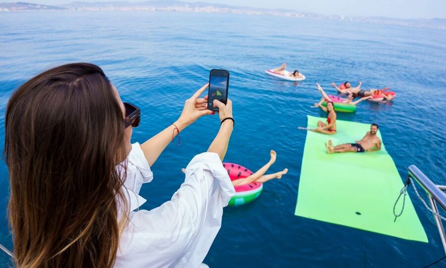 Barcelona: Sunset or Day Catamaran Cruise with Tapa & Drink - Sailing out from Marina Vela beside Barceloneta