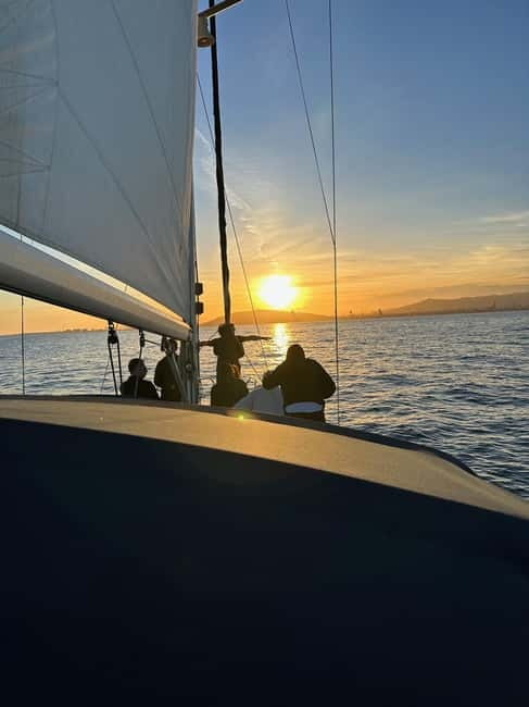 Barcelona: Sunset Sailboat Cruise with Open Bar and Snacks - Cava, snacks, and the social side of the boat