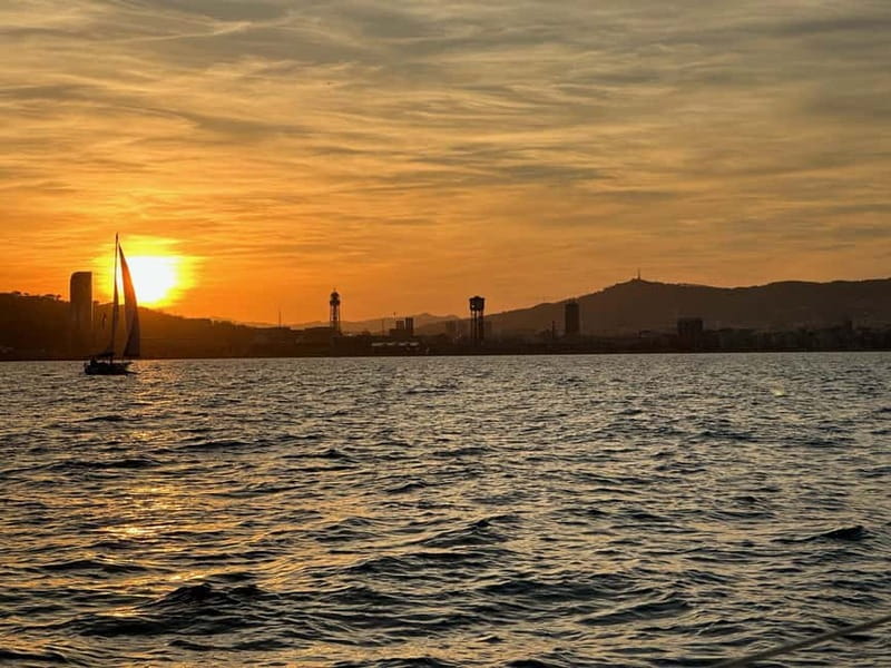 Barcelona: Sunset Sailboat Cruise with Open Bar and Snacks - Timing, weather, and what to bring