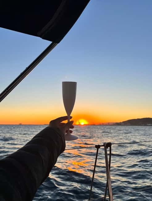 Barcelona: Sunset Sailboat Cruise with Open Bar and Snacks - The first 15 minutes across Olympic Port