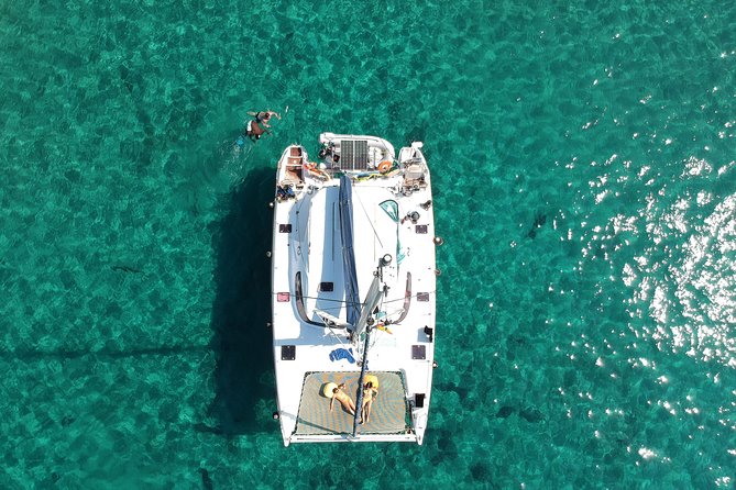 Best of Milos and Poliegos Catamaran snorkelling Cruise with BBQ - Poliegos and the Galazia Nera Blue Lagoon