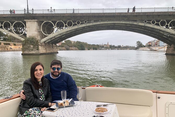 Boat Trip "Los Rincones del Guadalquivir" - Bridges, buildings, and changing river views