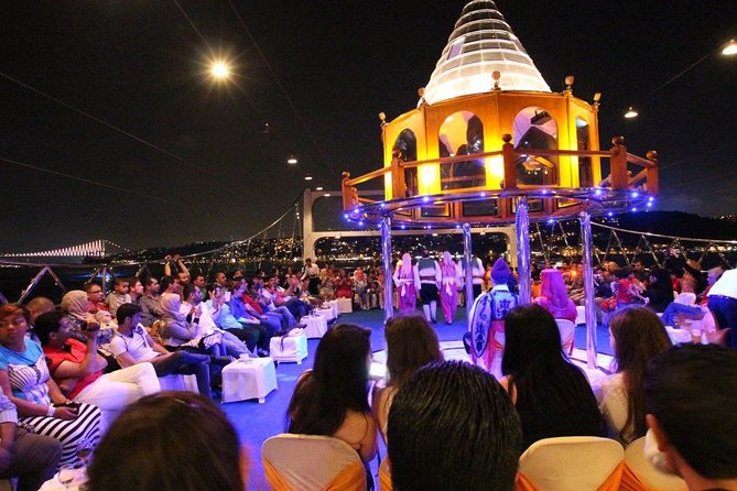 Bosphorus Night Cruise: Dinner, Drinks & Hotel Pickup - Istanbul after dark, seen from the Bosphorus