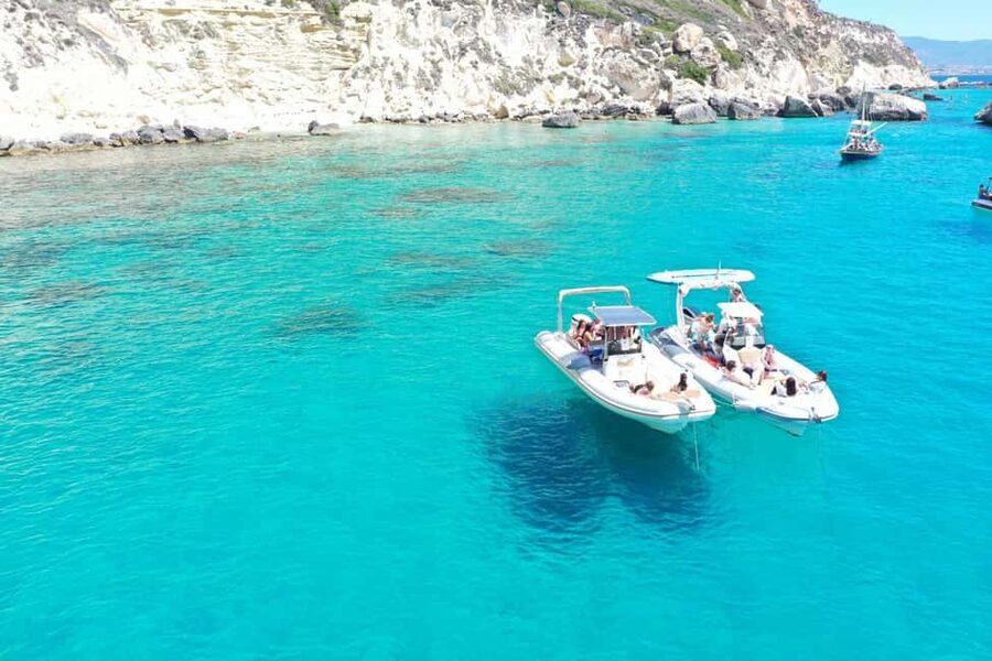 Cagliari: Boat Tour, 4 Stops, Swim, Snorkeling, & 1 Spritz - The quick run past Cagliari’s harbor