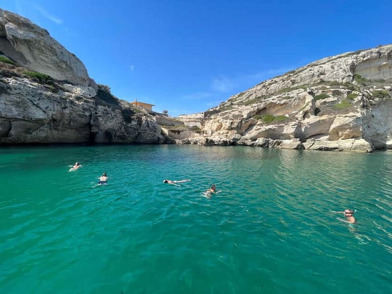 Cagliari: Boat Tour with 4 Swim Stops, Snorkeling & Prosecco - Cala Bernat and Cala Mosca: your first taste of the water