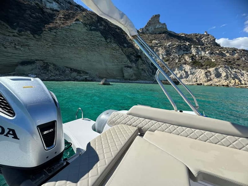 Cagliari: Boat Tour with 4 Swim Stops, Snorkeling & Prosecco - The guides and the atmosphere