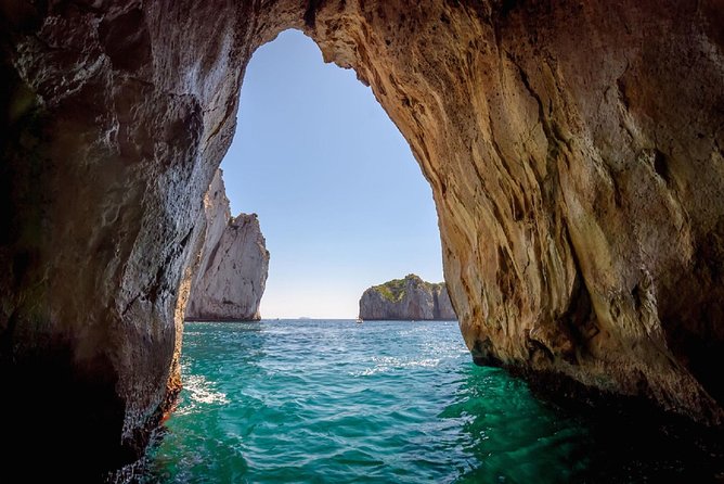 Capri Boat Tour from Sorrento: Swim, Grottos & Light Lunch - The Green Grotto and the Faraglioni rocks