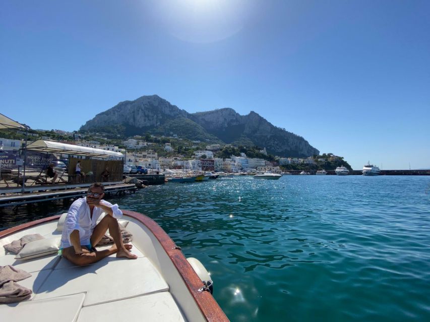 Capri: Island and Grottos Boat Cruise with Snacks and Drinks - Wind, spray, and changing conditions