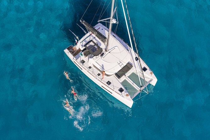 Catamaran Day & Sunset Cruises with meals Drinks and transportation - Sunset sailing and the return past Little Venice