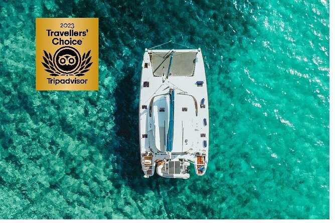 Catamaran Full-Day of Milos and Poliegos With Lunch & BBQ - Kalogries Beach gives you the first swim