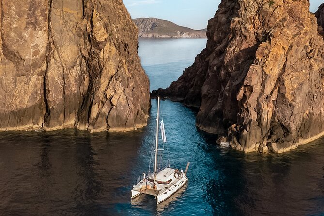 Catamaran Full-Day of Milos and Poliegos With Lunch & BBQ - Cape Vani and Milos volcanic beginnings