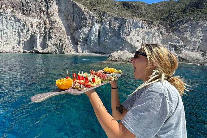 Catamaran Semi Cruise Paros Antiparos includes Food and Drinks - Despotiko and the meal served on board