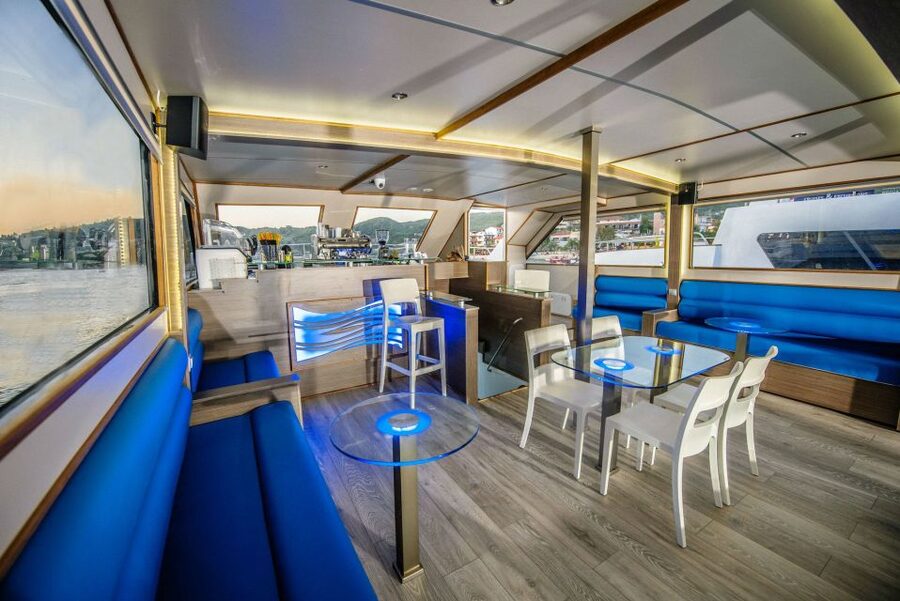 Chalkidiki: Blue Lagoon & Ammouliani Island Cruise & Lunch - Music, the VIP deck, and the feel on board
