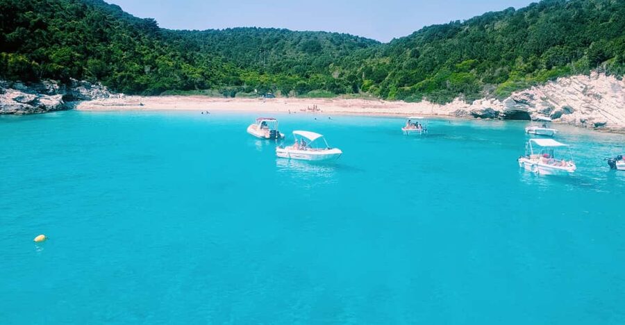 Corfu: Paxos Island Full-Day Cruise with Blue Caves - Leaving Corfu with the old town behind you