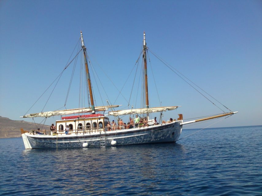 Corfu Town: Full-Day Cruise with Lunch, Drinks & Swim Stops - Meeting the Koryfo in Corfu’s old port