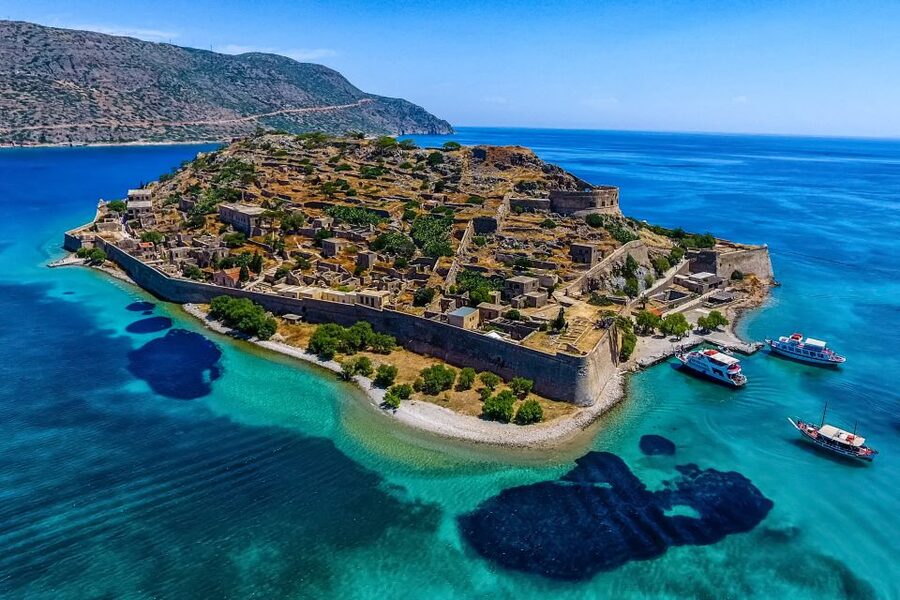 Crete: Spinalonga, Elounda, & Agios Nikolaos Boat Tour & BBQ - Kolokytha Beach and the onboard BBQ