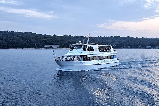 Dolphin Watching & Sunset Boat Tour With Dinner and Drinks - Veliki Brijun and the island’s layered past
