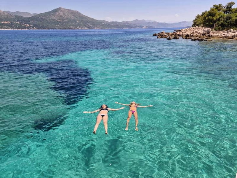 Dubrovnik: Blue Cave, Green Cave & Sunj Beach Speedboat Tour - Entering the Blue Cave at Koločep