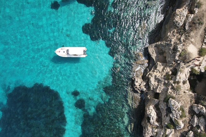 Favignana and Levanzo, Egadi islands tour by boat from Trapani - Cala Rossa delivers the clearest water