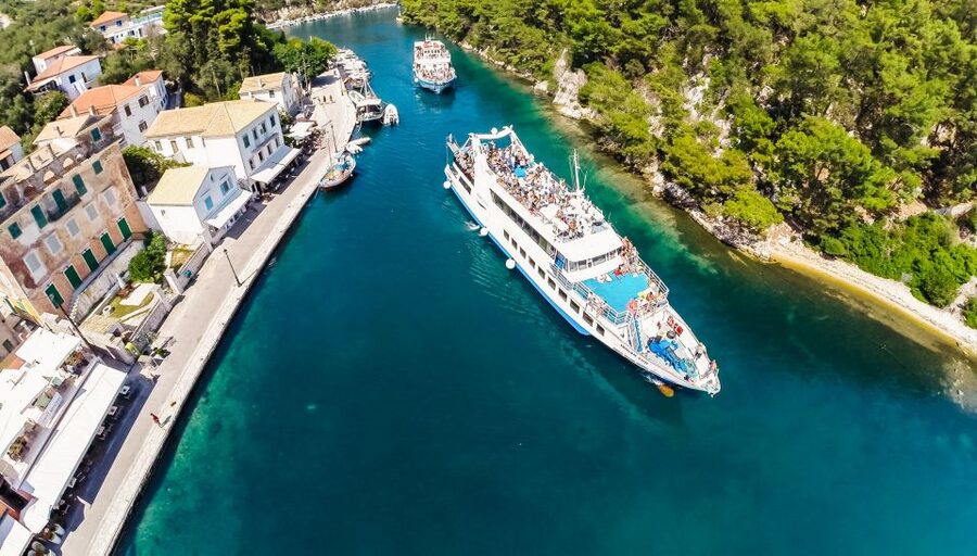 From Corfu: Day Cruise to Paxos, Antipaxos, and Blue Caves - Guides, languages, and the onboard mood