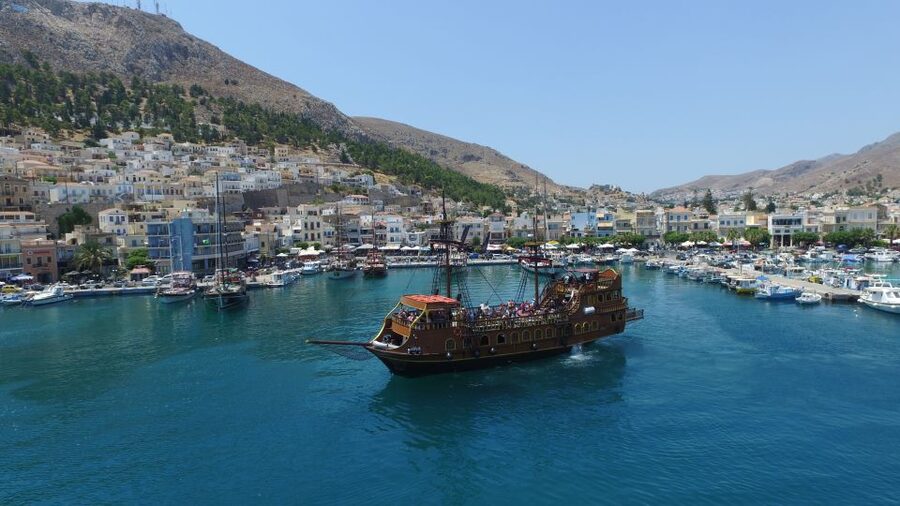 From Kos: 3-Island Pirate Cruise with Lunch and Waterslide - A pirate boat with a party spirit