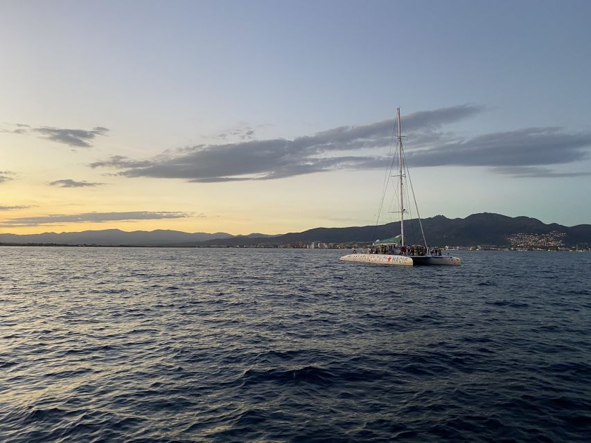 From Roses: Sunset Catamaran Cruise - Roses and Empuriabrava as evening lights appear